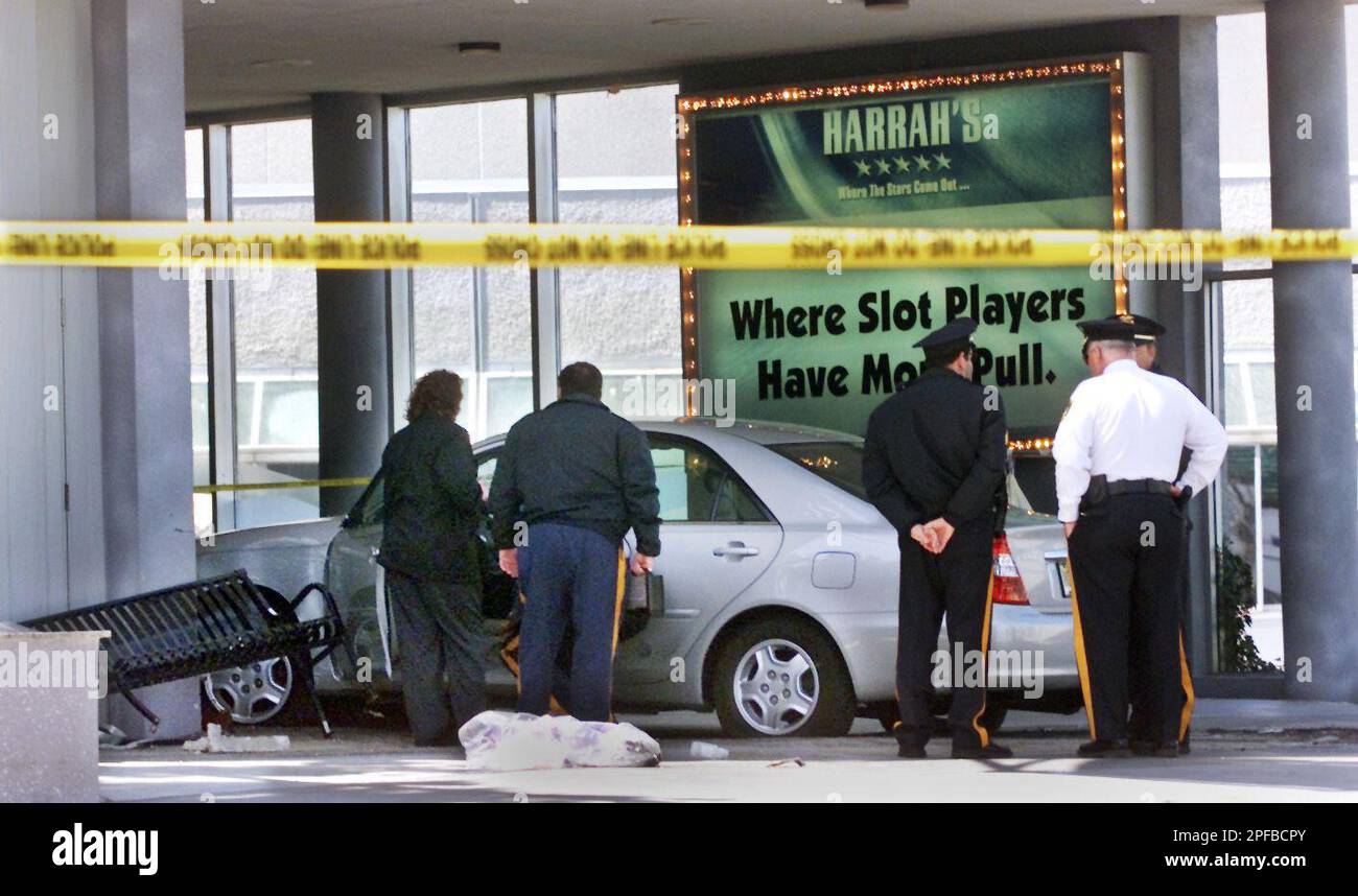 Investigators look over an accident scene at Harrah's Atlantic City