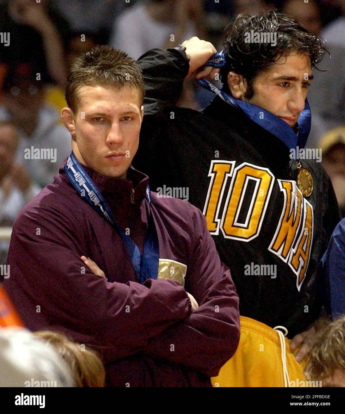 Minnesotas Jared Lawrence, left, reacts as Iowa's Mike Zadick, right, is  awarded the first-place medal in the 149-pound championship match at the  Big Ten wrestling tournament, Sunday, March 10, 2002, at Assembly