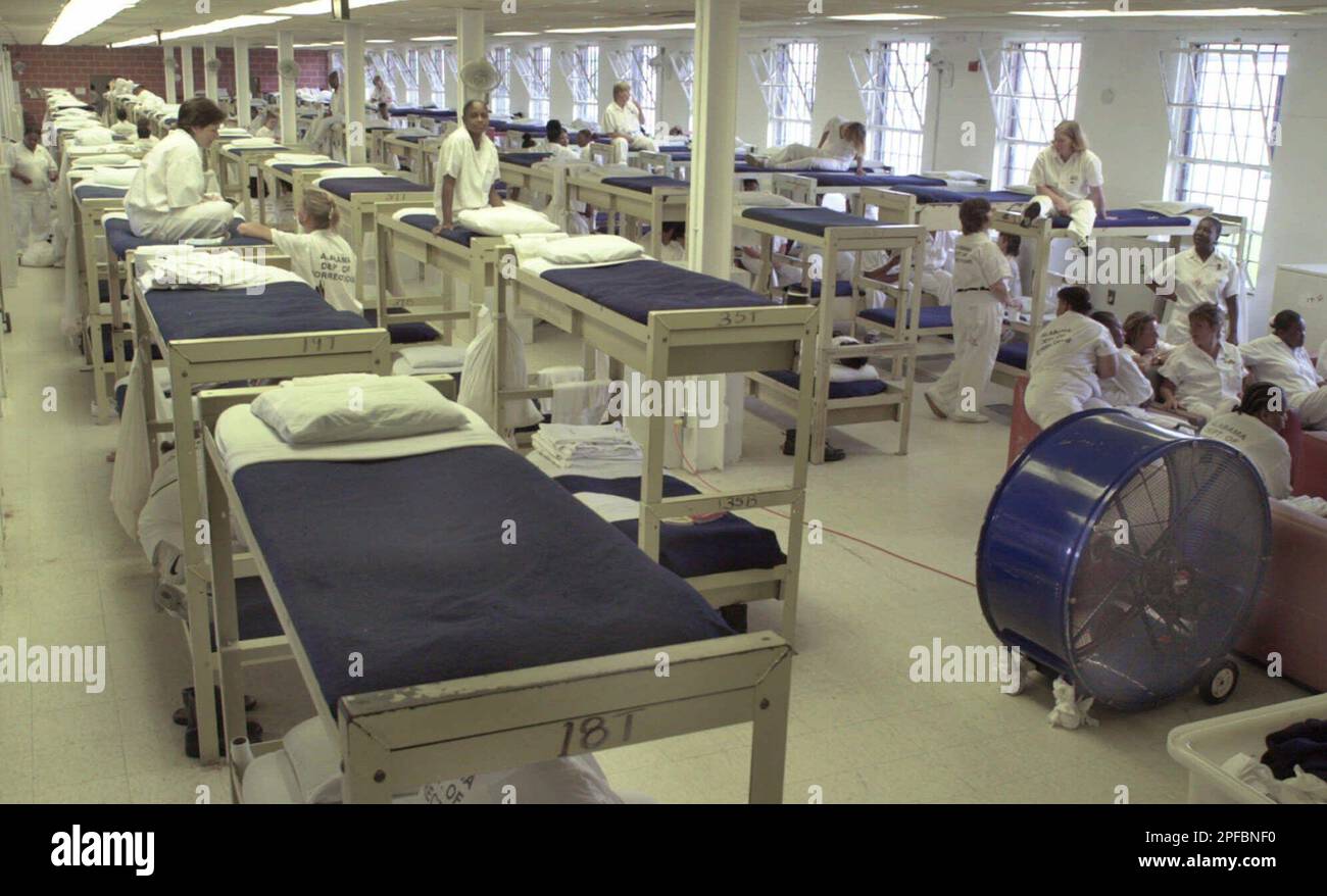 With windows open and no air conditioning, a large floor fan, seen at
