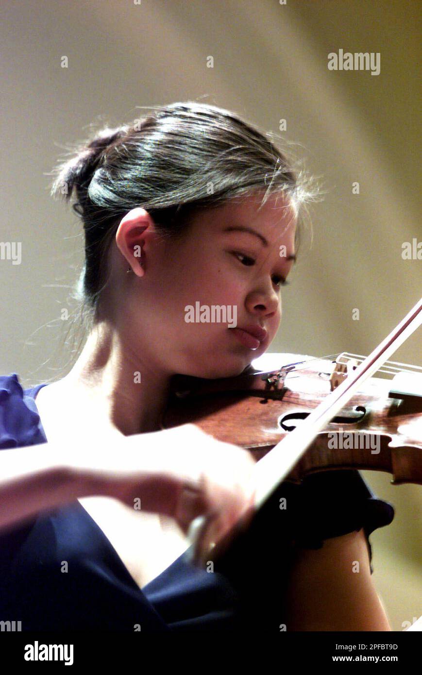 Singaporean violinist Lee Huei Min, 18, plays at a practice session in