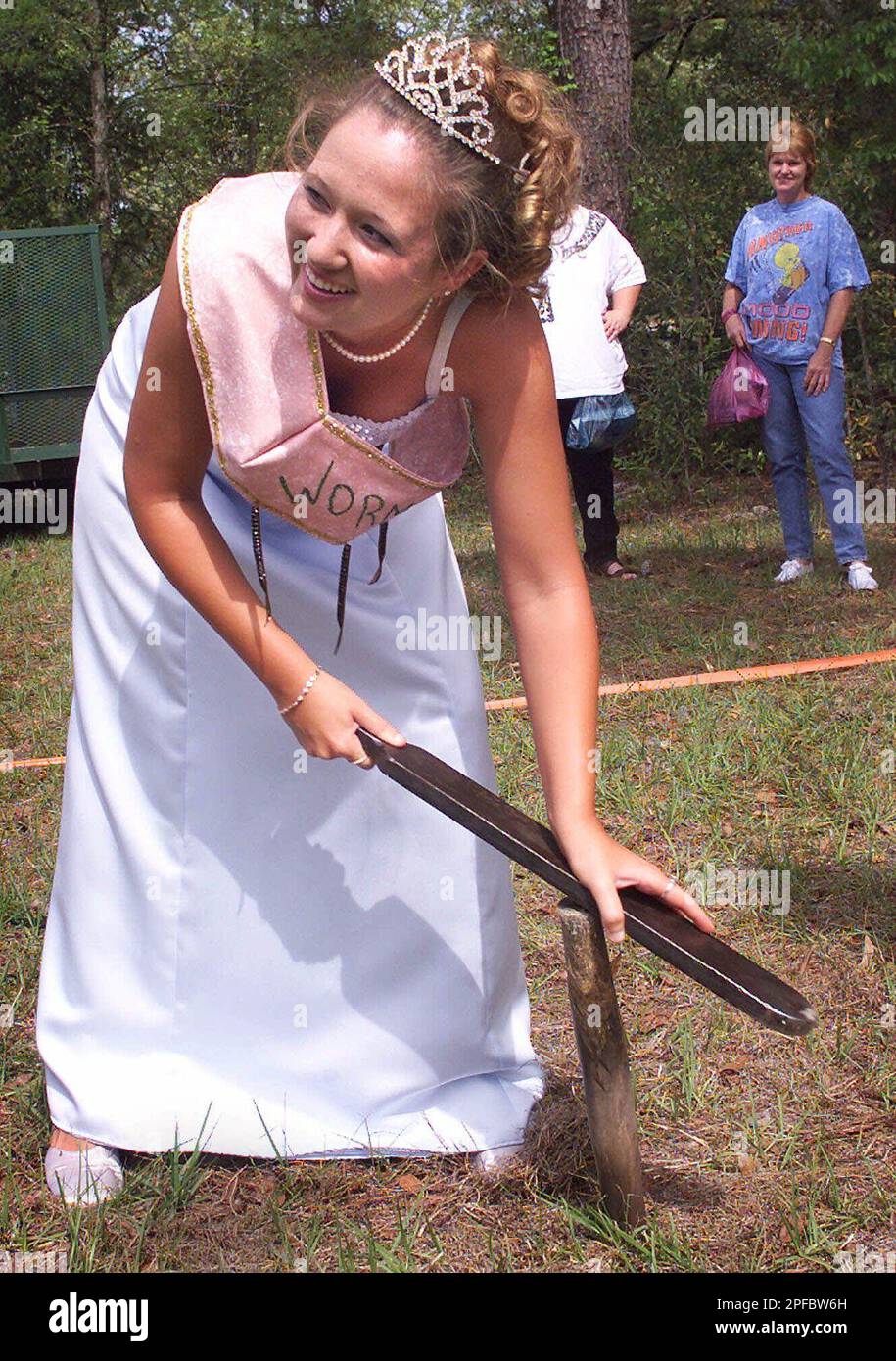 Worm grunting queen Amy Stokley, 17, from Sopchoppy, Fla., tries her hand  at worm grunting after being named queen of the first Sopchoppy Worm  Grunting Festival on Saturday April 7, 2001 in