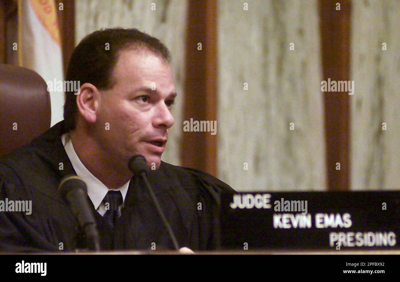 Presiding Judge Kevin Emas talks to the attorneys during the trial of