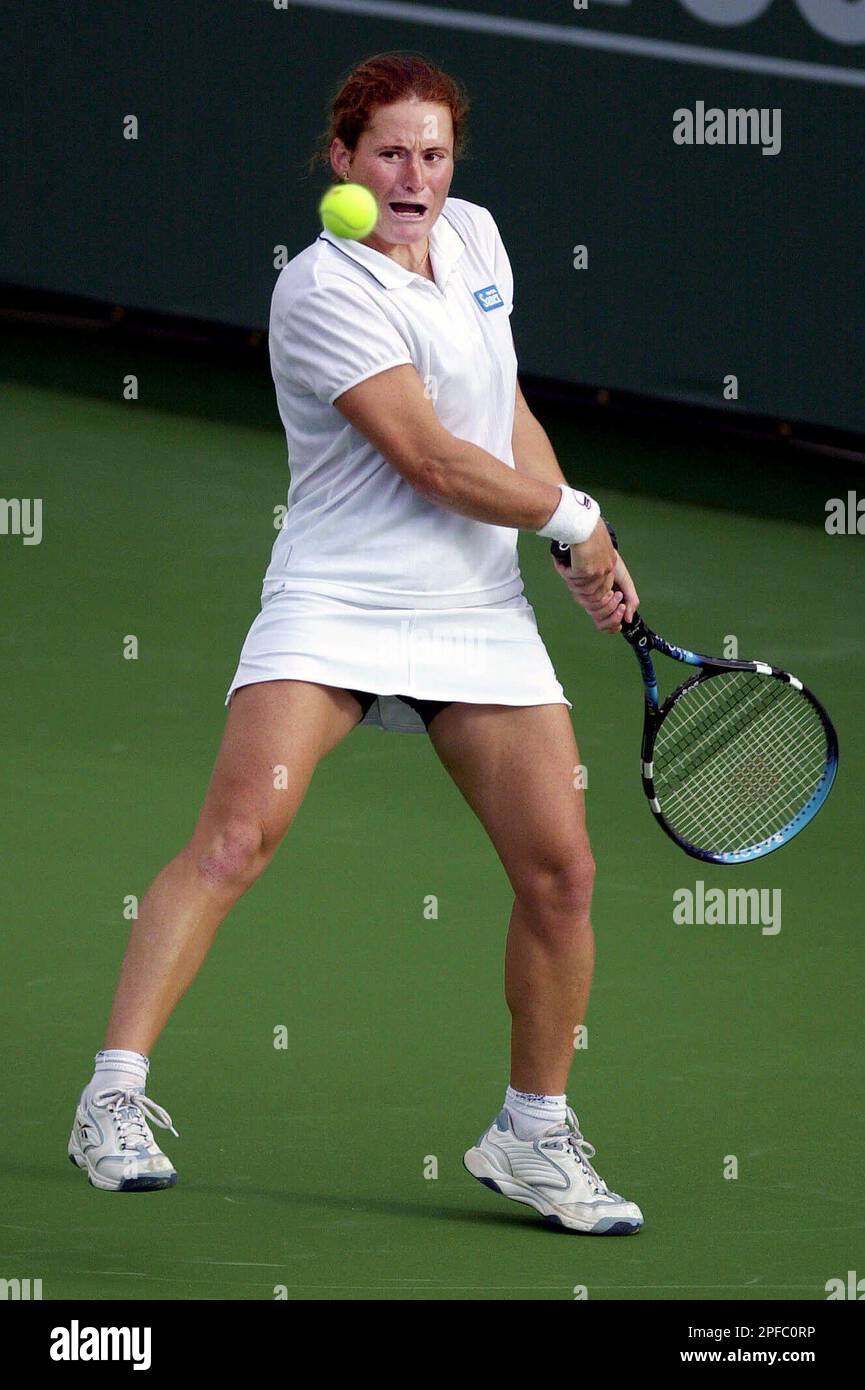 Virginia Ruano Pascual, of Spain, returns a shot to fellow countryman Angeles Montolio during the first round of the Tennis Masters Series, Wednesday, March 7, 2001, in Indian Wells, Calif. Pascual won the match 7-5, 3-6, 6-3. (AP Photo/Mark J. Terrill) Stock Photo