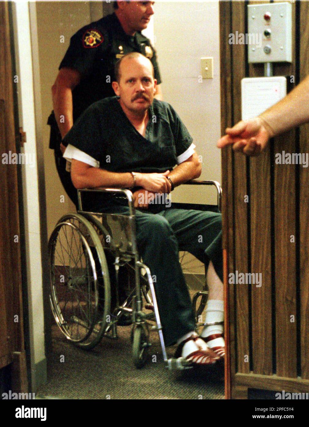 Curtis Dean Anderson is wheeled in a Solano County Superior Courtroom in  Vallejo, Calif., Friday, Aug. 18, 2000 before his arraignment hearing.  Vallejo police are investigating Anderson on suspicion of kidnapping  8-year-old