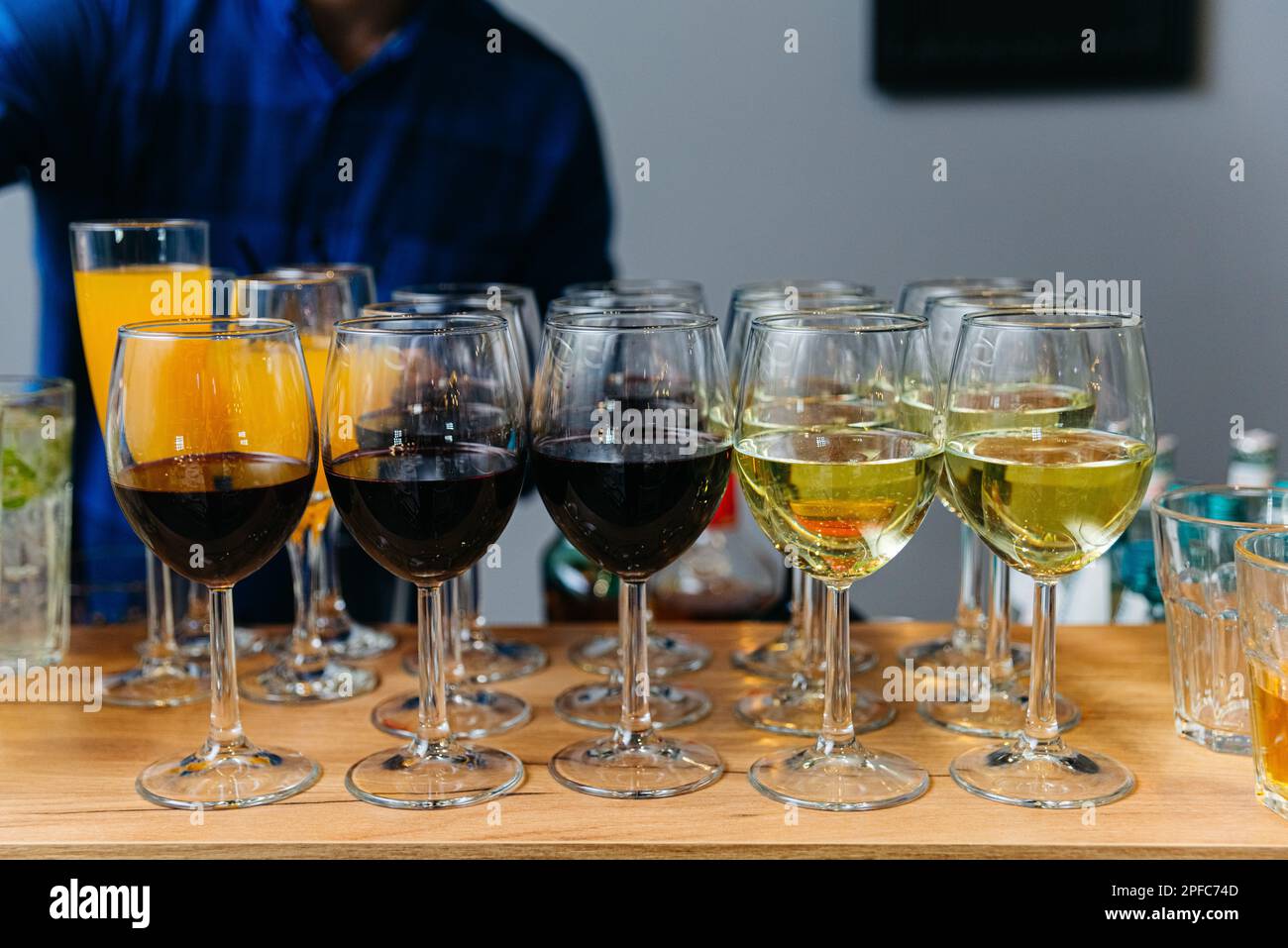 Set of red and white wine served in glasses at bar counter Stock Photo