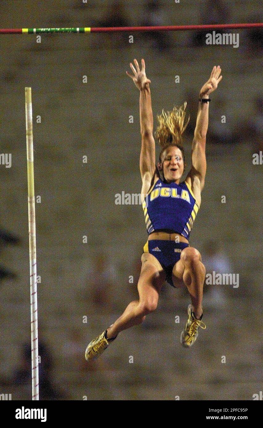 UCLA's Tracy O'Hara celebrates as she wins the pole vault with a meet