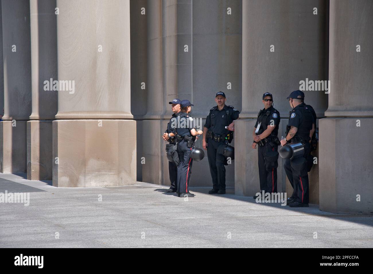 Toronto Riot Cops Toronto, Ontario, Canada - 06/15/2010: Riot police in full gear stand ...