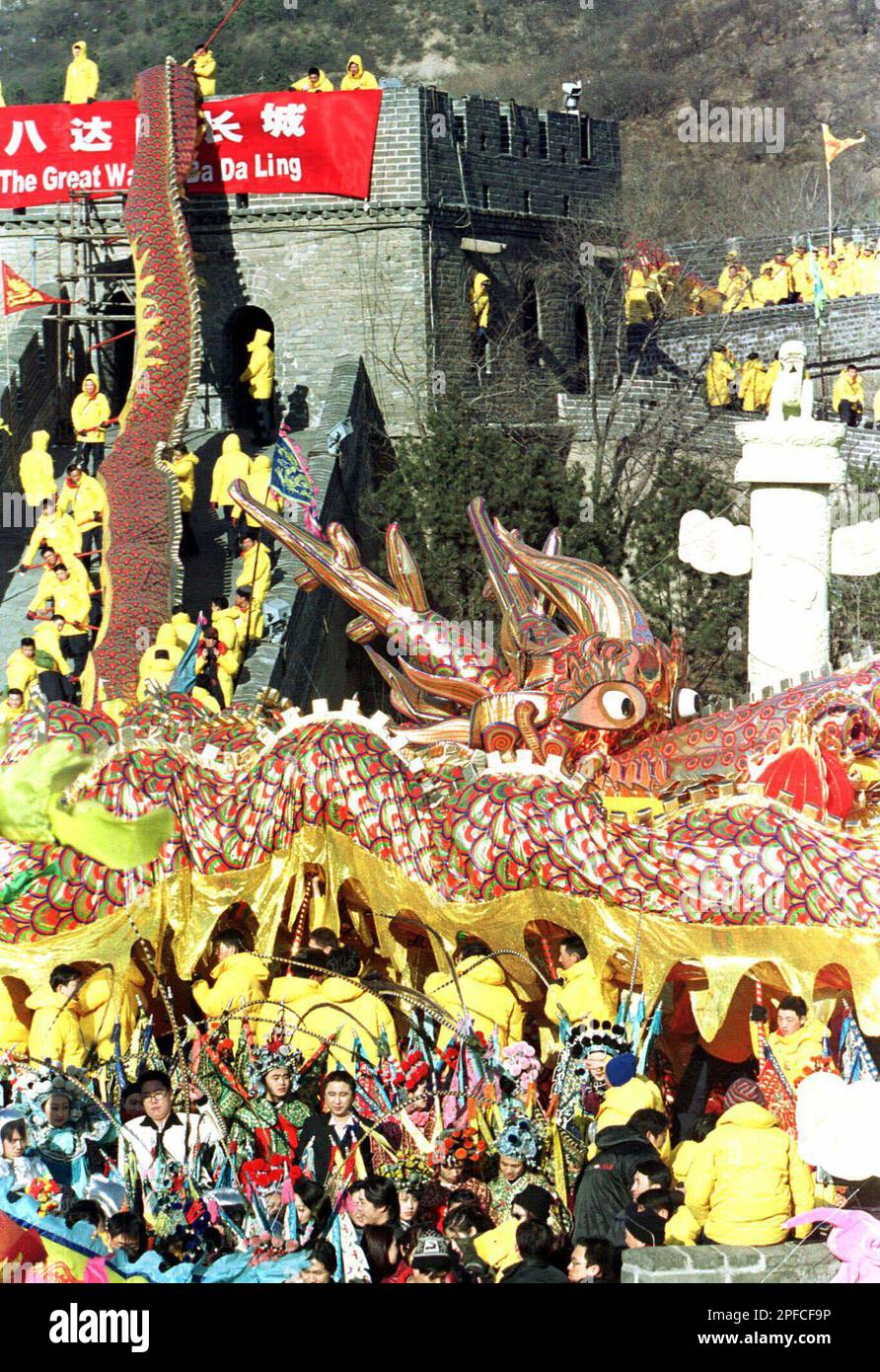 Chinese youths try to break the world record for the longest dragon dance  at the Great Wall outside of Beijing on Saturday, February 19, 2000. The  dragon was 10,000 feet long (3,048