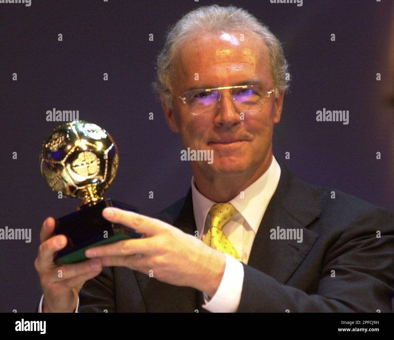 Voted by the International Federation of Football History and Statistics as  the worlds third best soccer player of the Century Franz Beckenbauer,  former German national soccer player, displays his trophy during the