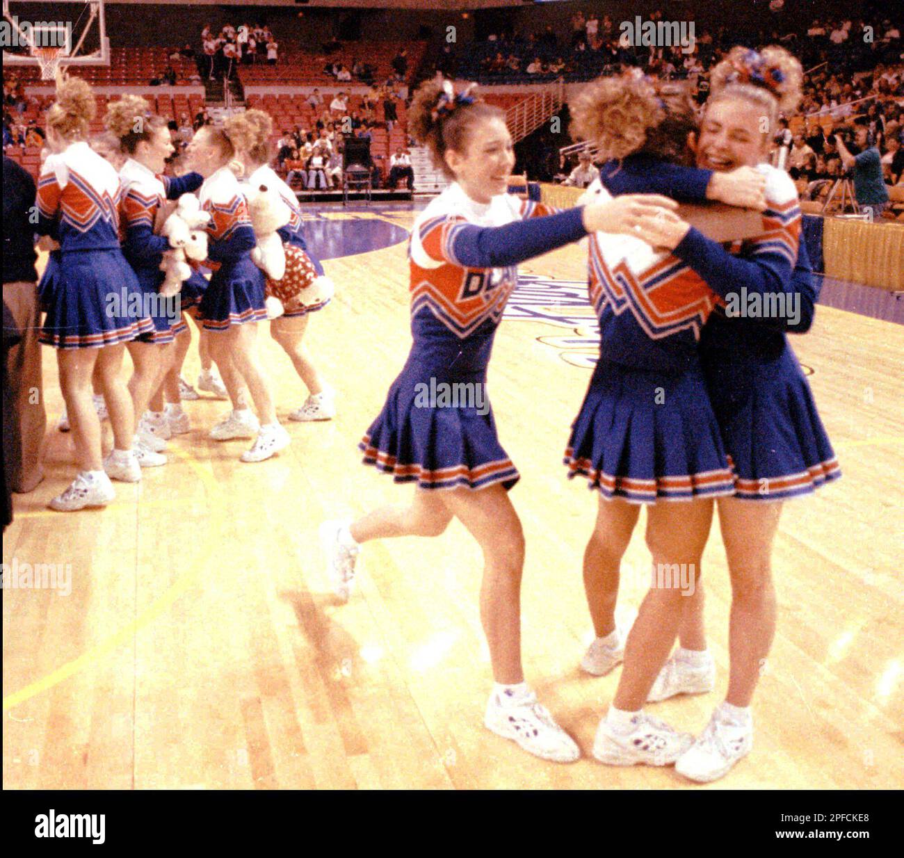 Fairmont Senior High School cheerleaders from Fairmont, W.Va., celebrate their win in the Class