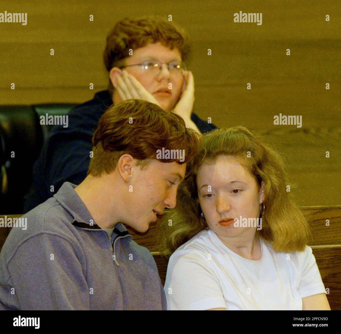 Thurston High School student Josh Ryker, left, who helped capture Kip