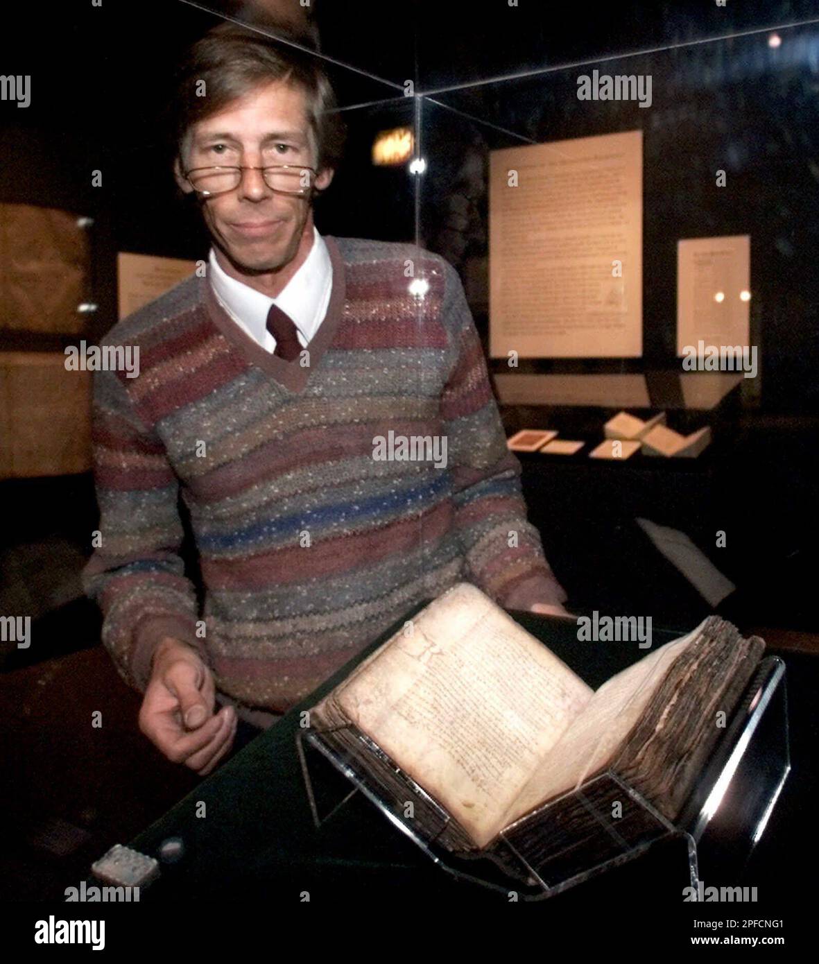 Librarian benjamin williams stands with the archimedes palimpsest