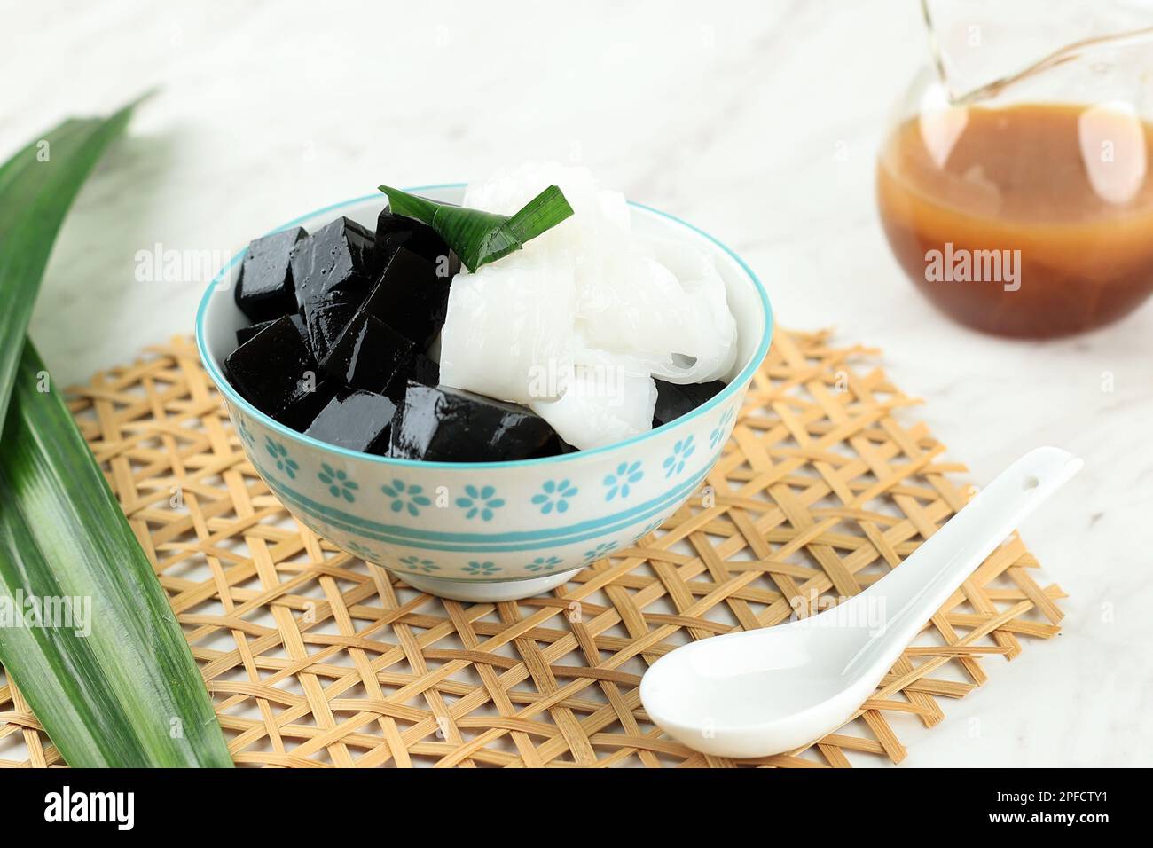 Black Herbs Grass Jelly with Shredded Coconut Meat, Served with palm