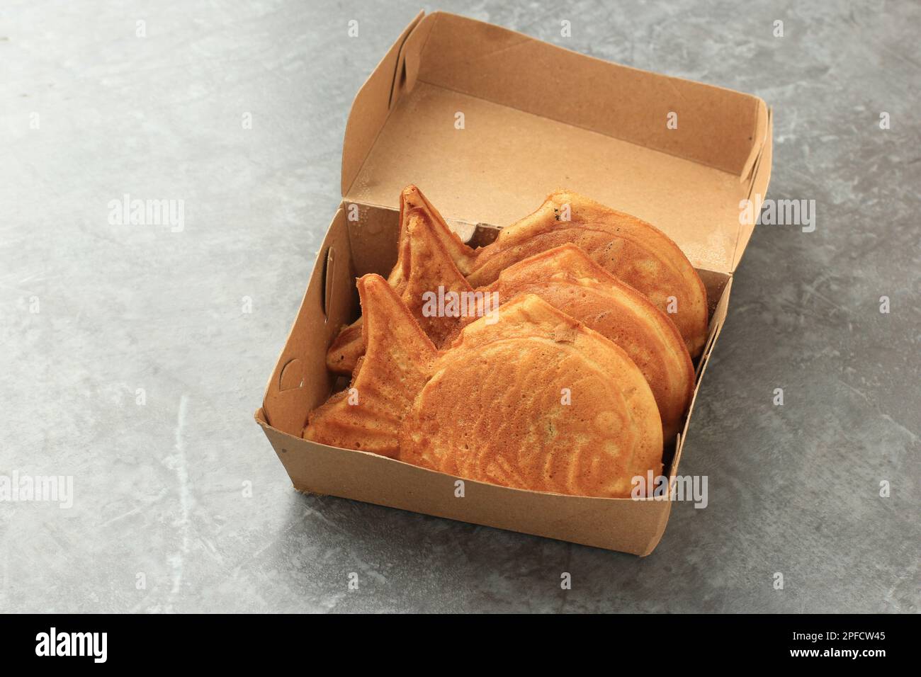 Taiyaki Fish Shape Japanese Pancake with Red Bean Filling. Concept on