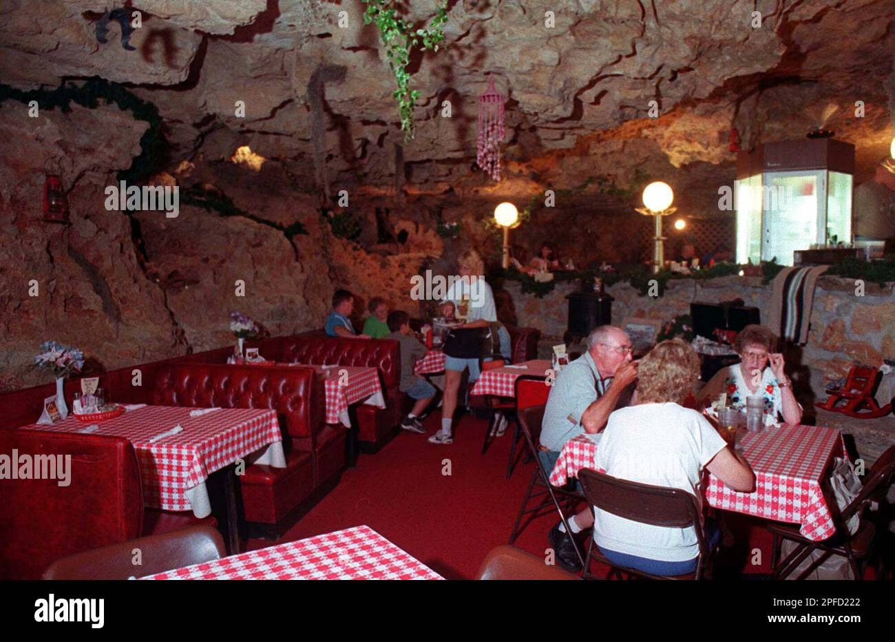 ADVANCE FOR WEEKEND JULY 3-4--One hundred feet above the Gasconade River,  restaurant patrons experience dining in a cave Thursday, June 24, 1999,  near Richland, Mo. The cave, now smoke-free, alcohol-free and catering