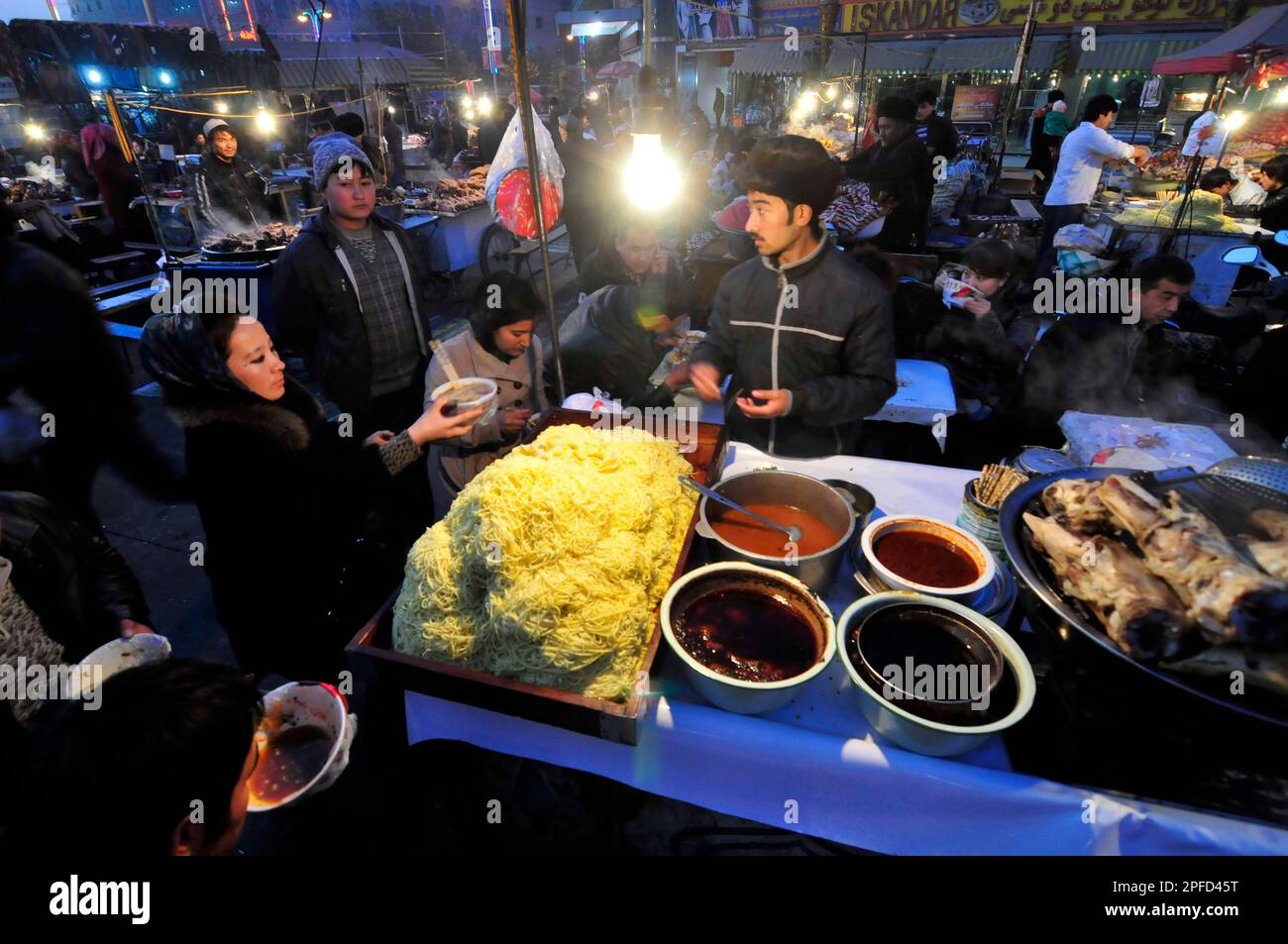 A Laghman food stall in the old city of Kashgar, China. Stock Photo