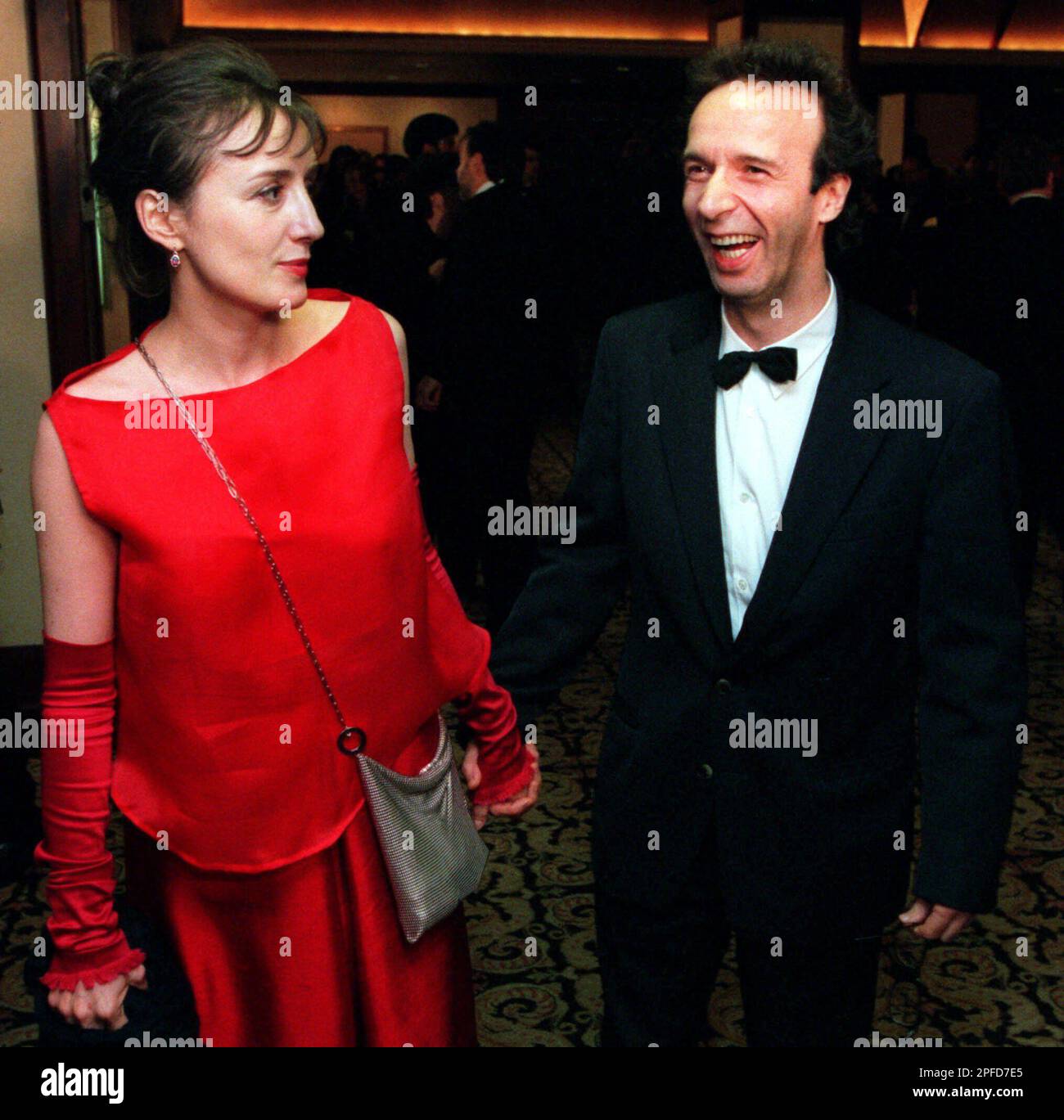 "Life is Beautiful" director Roberto Benigni, with his wife, actress