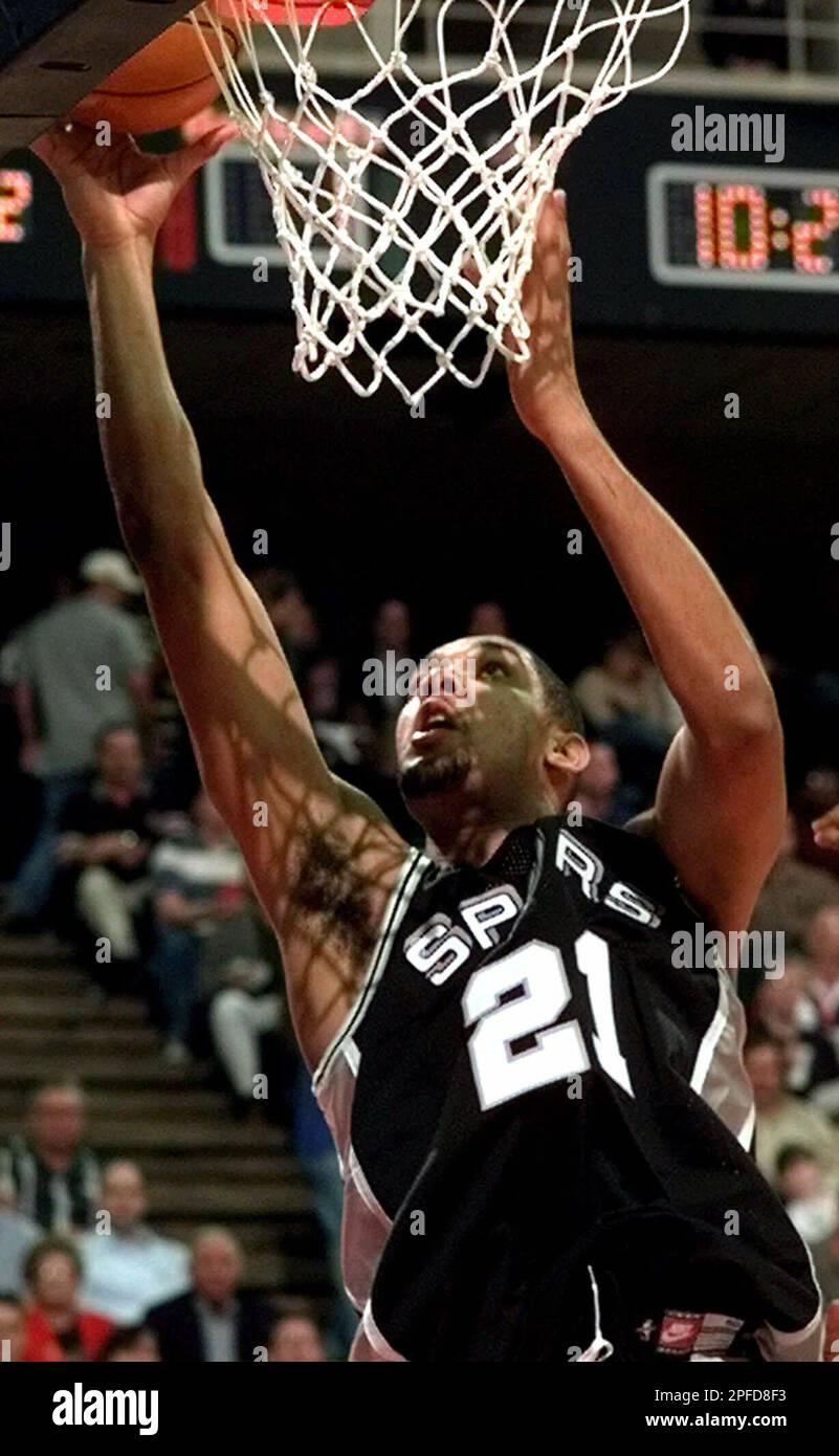 San Antonio Spurs' Tim Duncan goes to the basket against the Houston