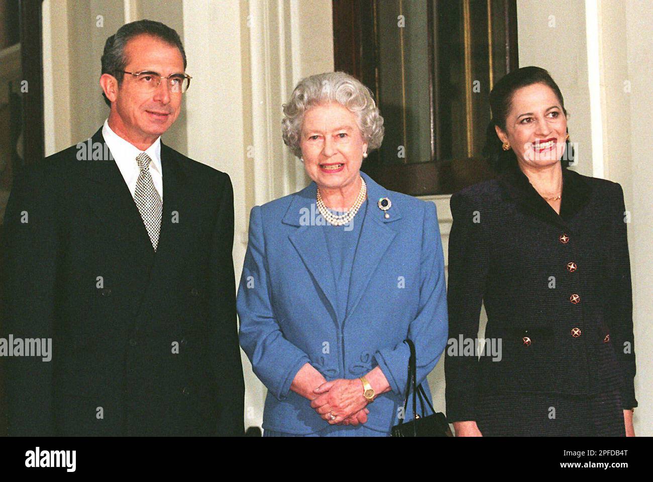 Britain's Queen Elizabeth II, center, smiles alongside Mexican President Ernesto Zedillo and his Britain's Queen Elizabeth II, center, smiles alongside Mexican President Ernesto Zedillo and his