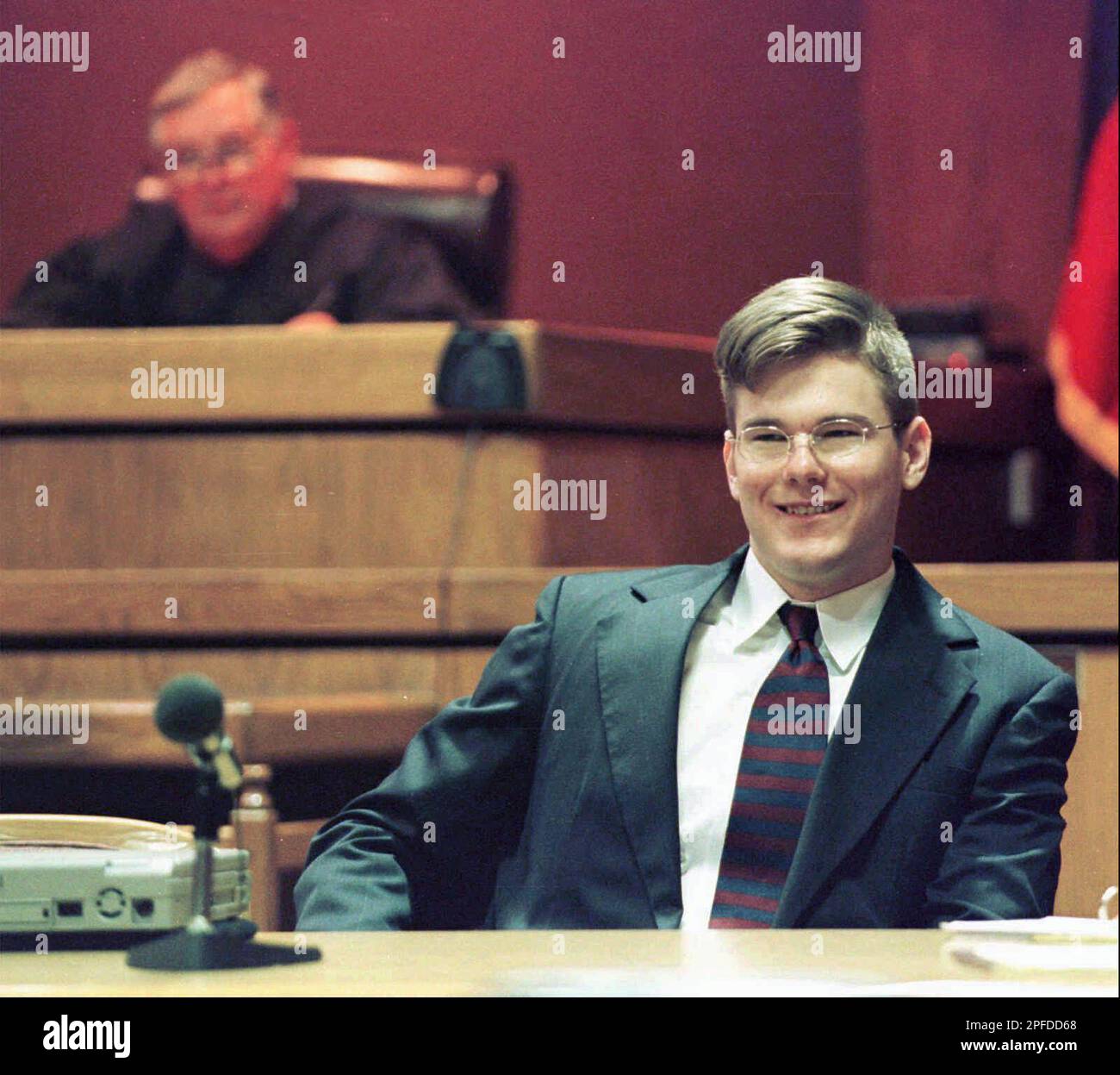 Former Air Force Academy cadet David Graham, 20, smiles while judge Don