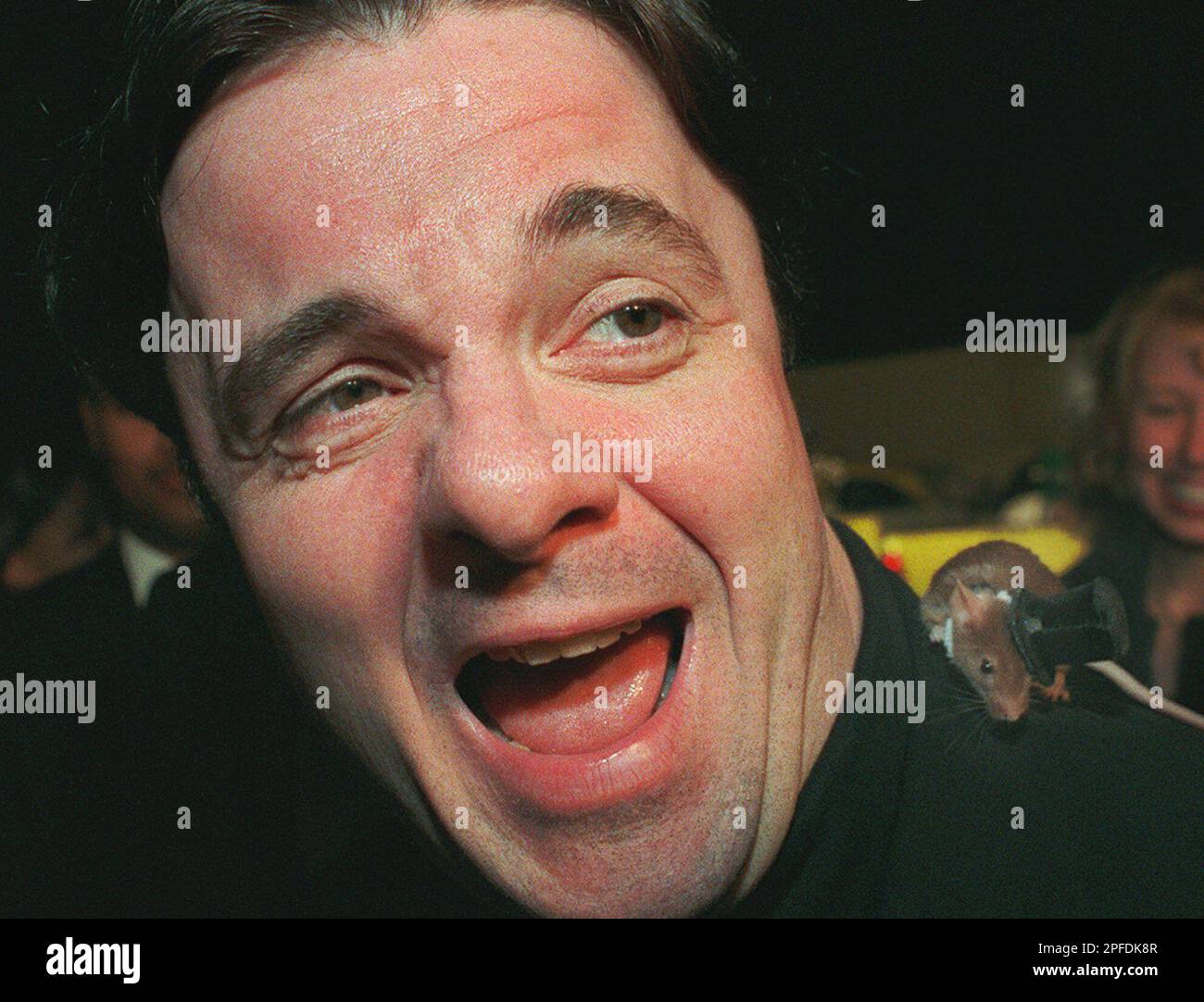 Actor Nathan Lane reacts after being joined by "Jenny," Lane's costar