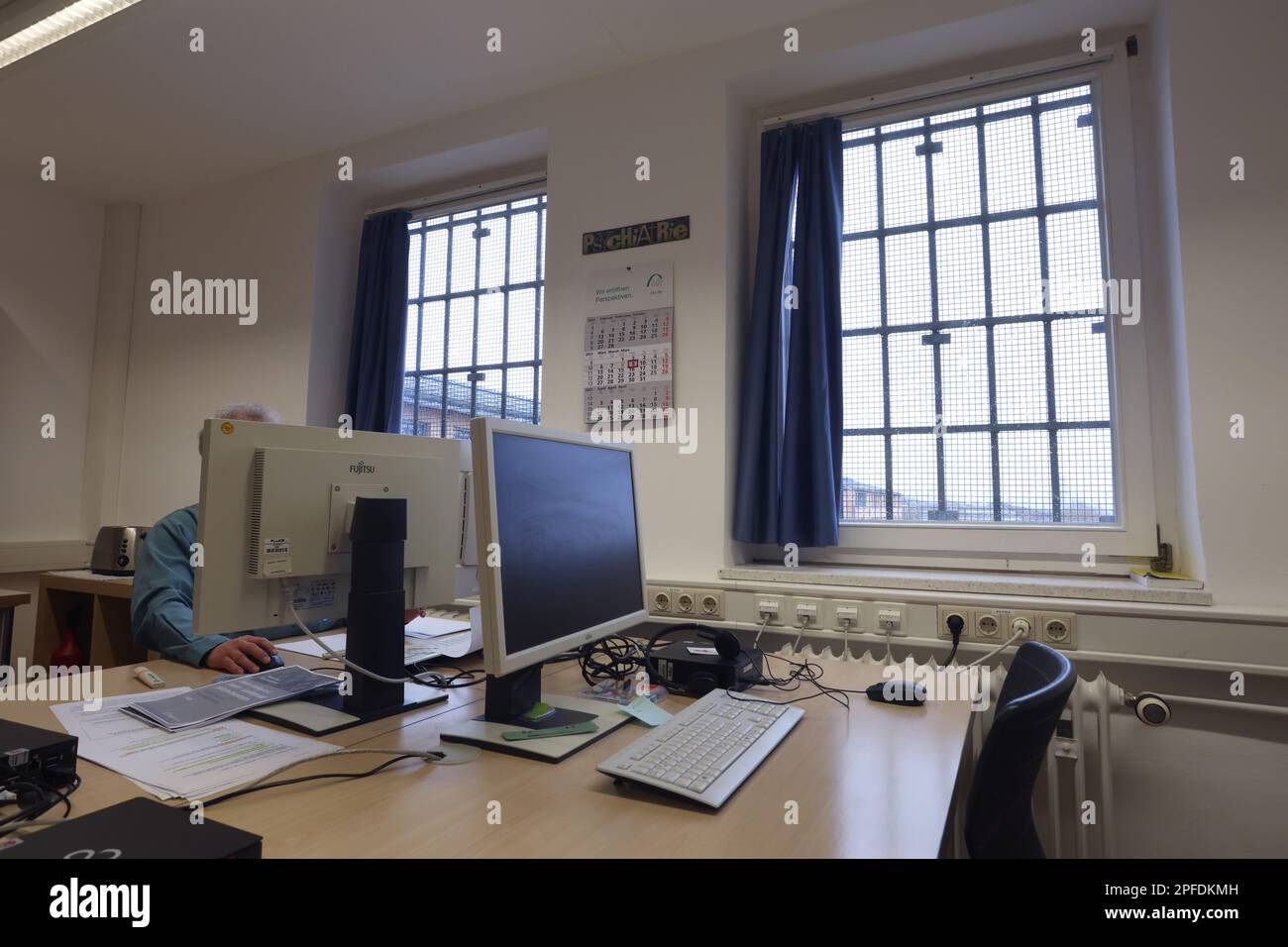 09 March 2023, Bavaria, Würzburg A student prisoner sits at a computer