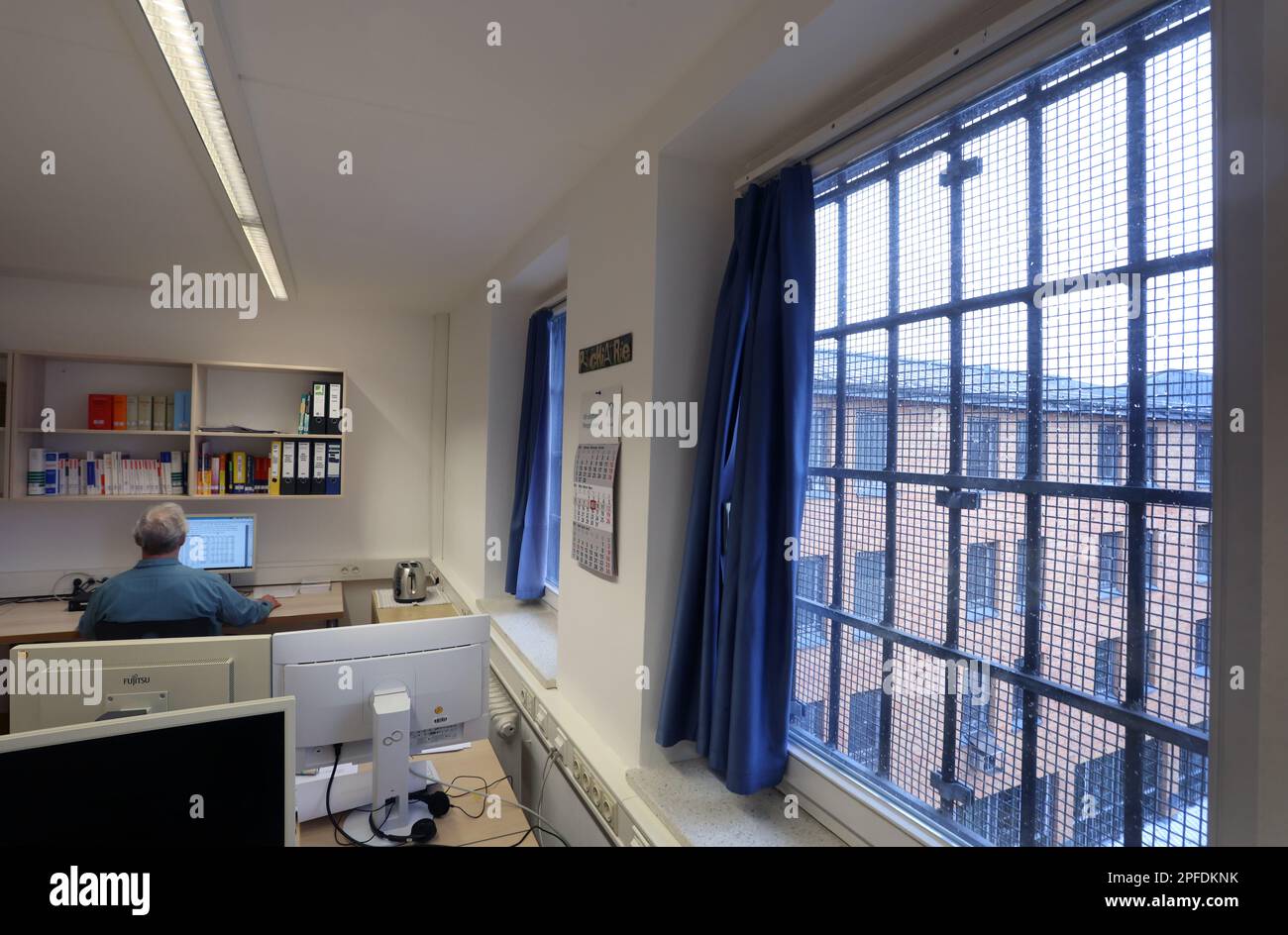 09 March 2023, Bavaria, Würzburg A student prisoner sits at a computer
