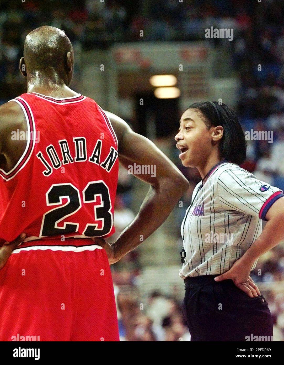 Referee Violet Palmer right talks with Chicago Bulls star