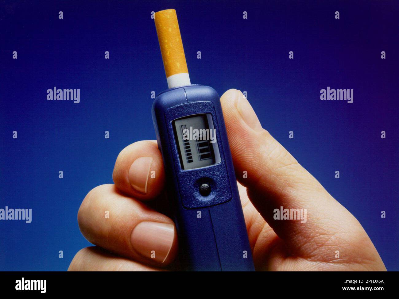 cos cigarette Philip Morris Cos. plans to test a microelectronic cigarette holder, shown  in this undated handout, that eliminates the smoke and ashes from the end  of a cigarette, The New York Times reported