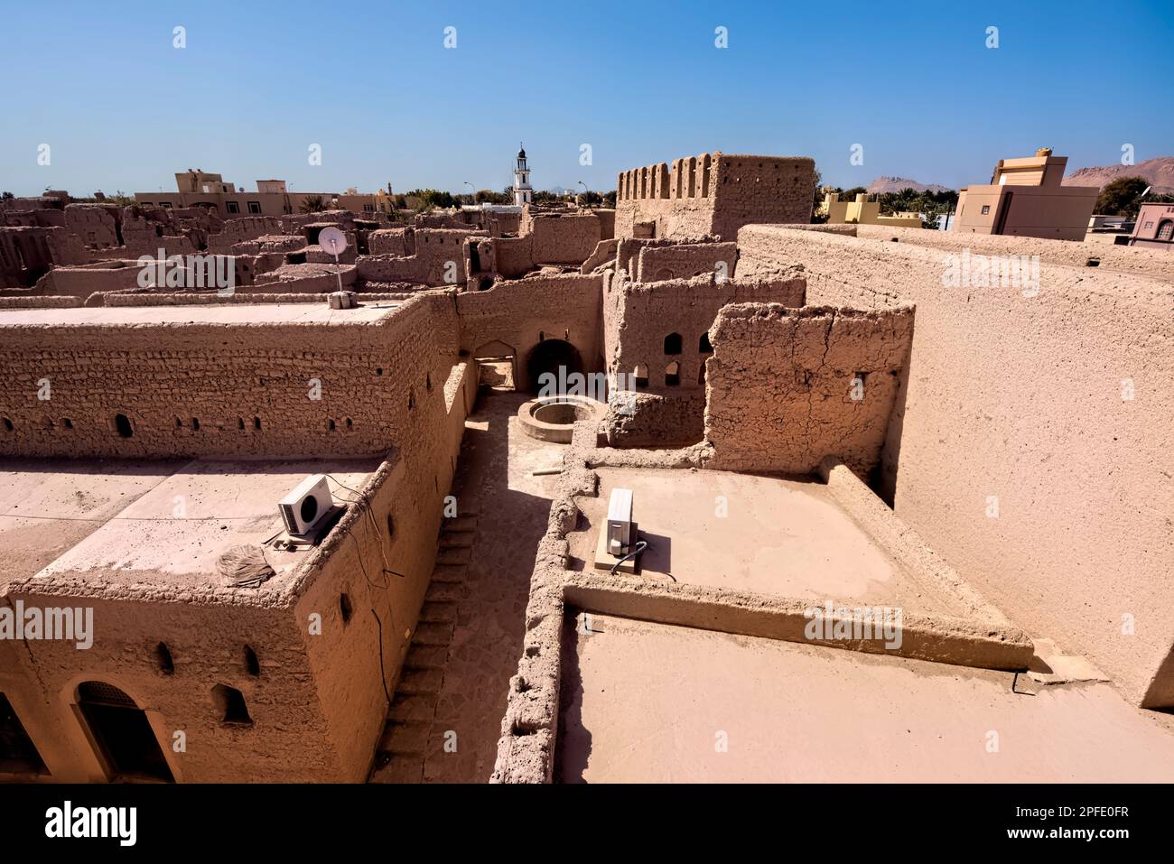 Ruined old walled village of Harat al Bilad, Manah, Oman Stock Photo ...
