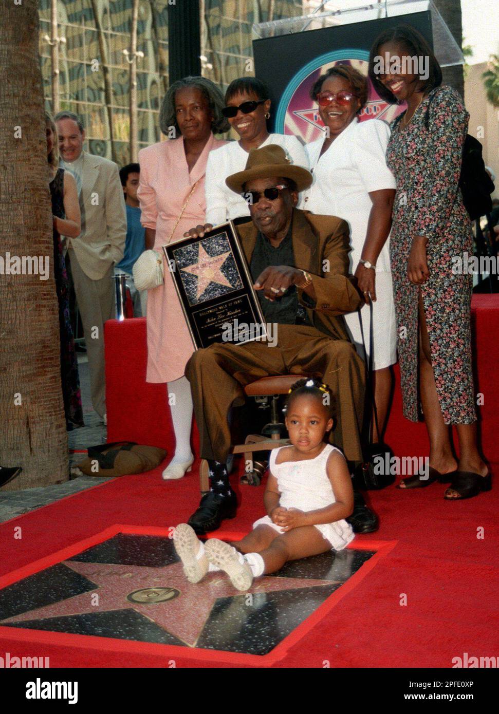 Blues artist John Lee Hooker points to his new star and 2yearold