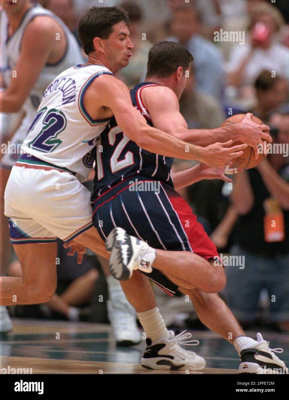 Utah Jazz John Stockton taps the ball loose from Houston Rockets Matt  Maloney during the third period of their Western Conference Finals game  Monday, May 19, 1997 in Salt Lake City. The