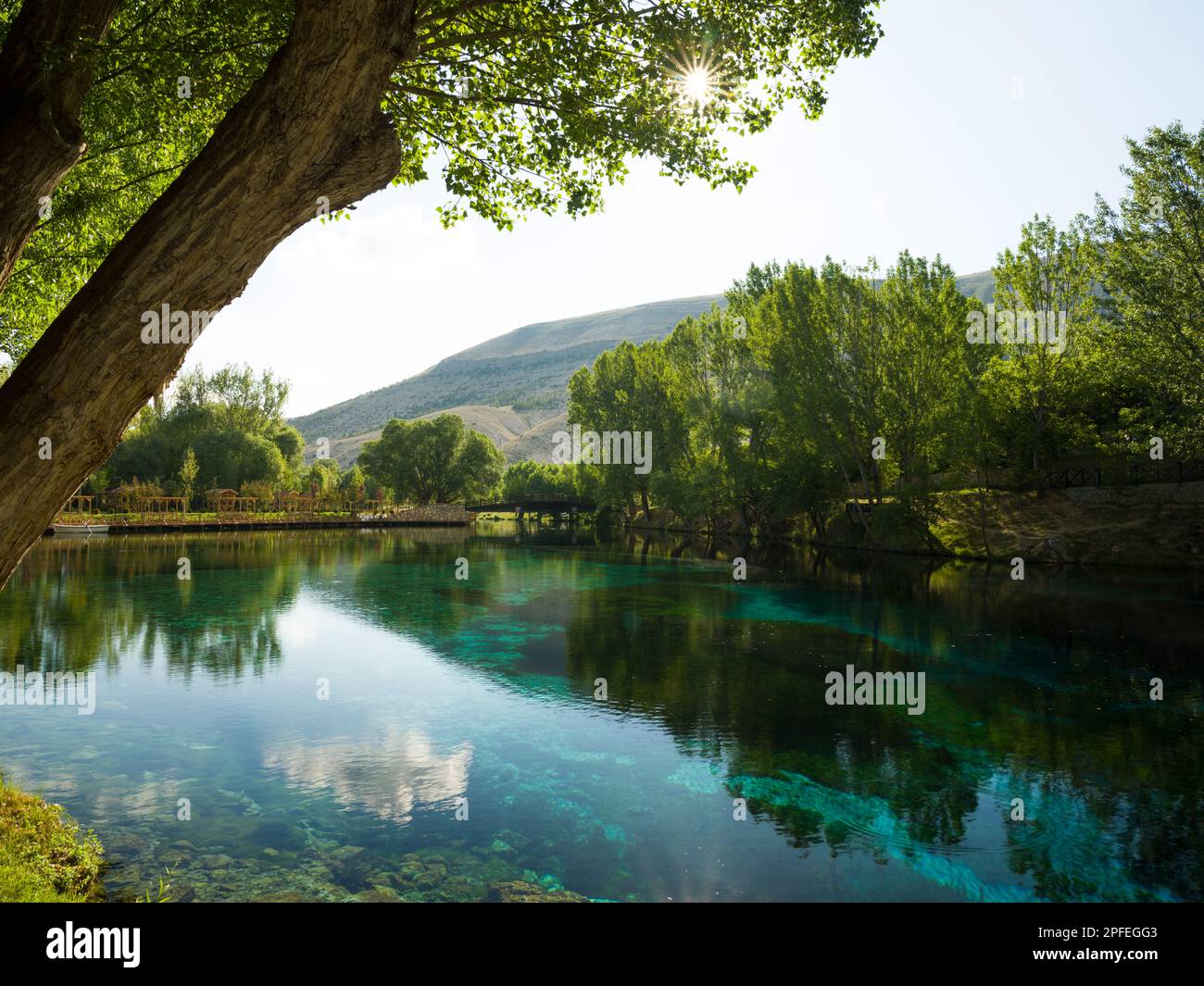 Blue lake in the park. View of Gokpinar Lake in the morning light. Gurun district, Sivas, Turkey Stock Photo