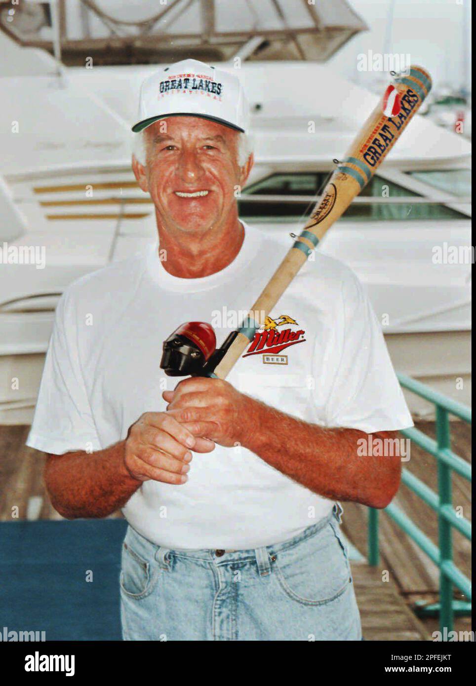 baseball and fishing pole Bob Uecker had a fishing pole made out of a baseball bat at the celebrity  introduction to his charity fishing tournament in Racine, Wis., Thursday,  June 20, 1996. The three-day Bob Uecker's