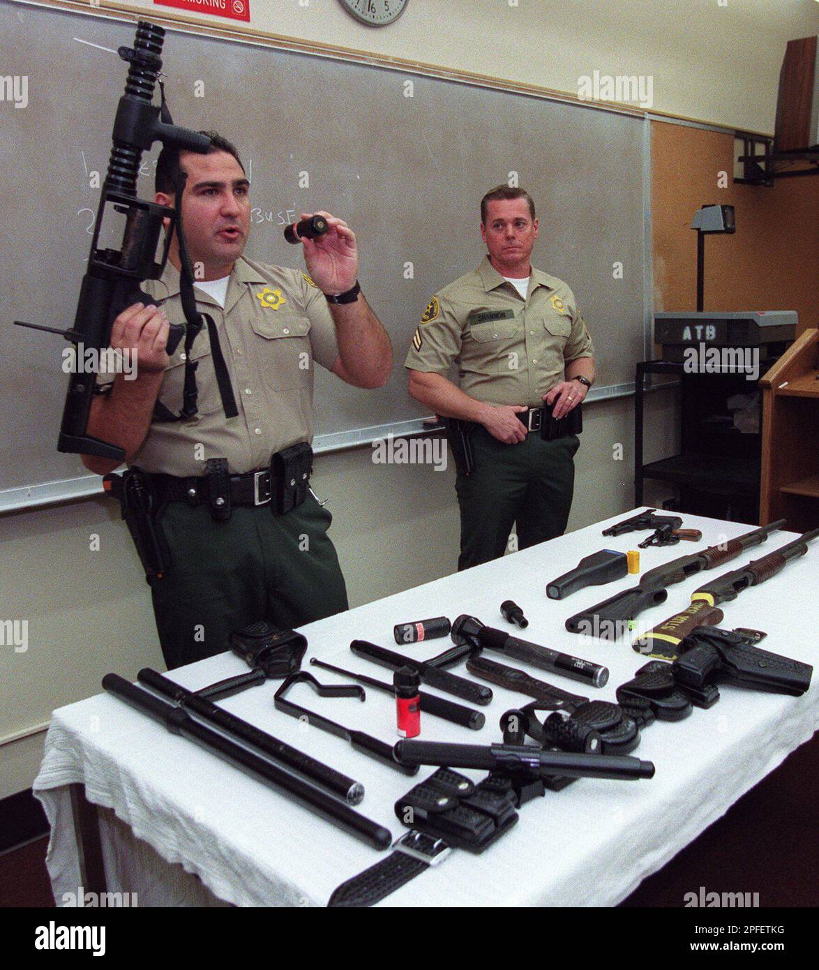 Deputy Mike O'Shea, left, a training officer for the Los Angeles County ...