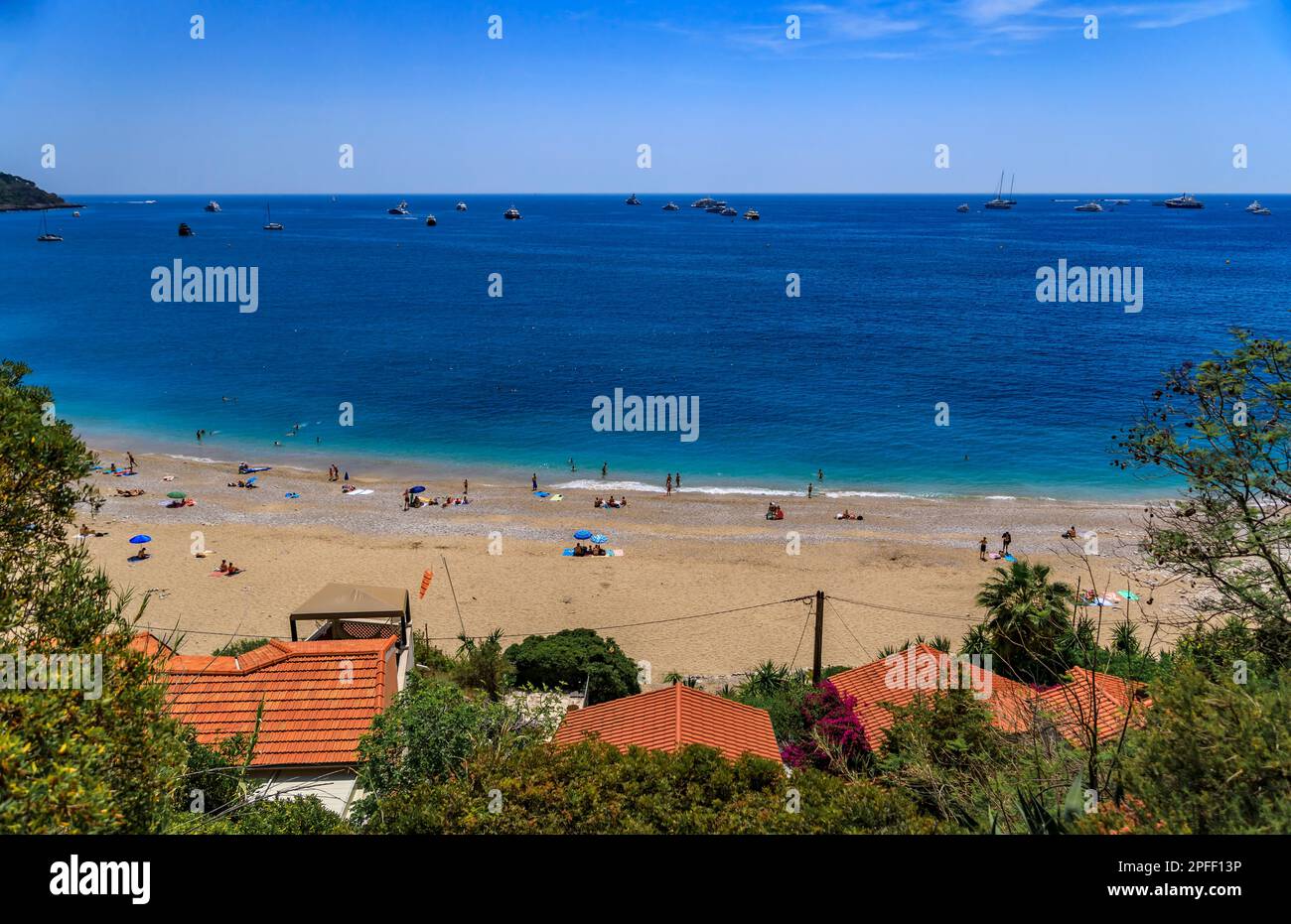 View onto the turquoise water of the Mediterranean Sea and coastline in Roquebrune Cap Martin, South of France near Monaco Stock Photo