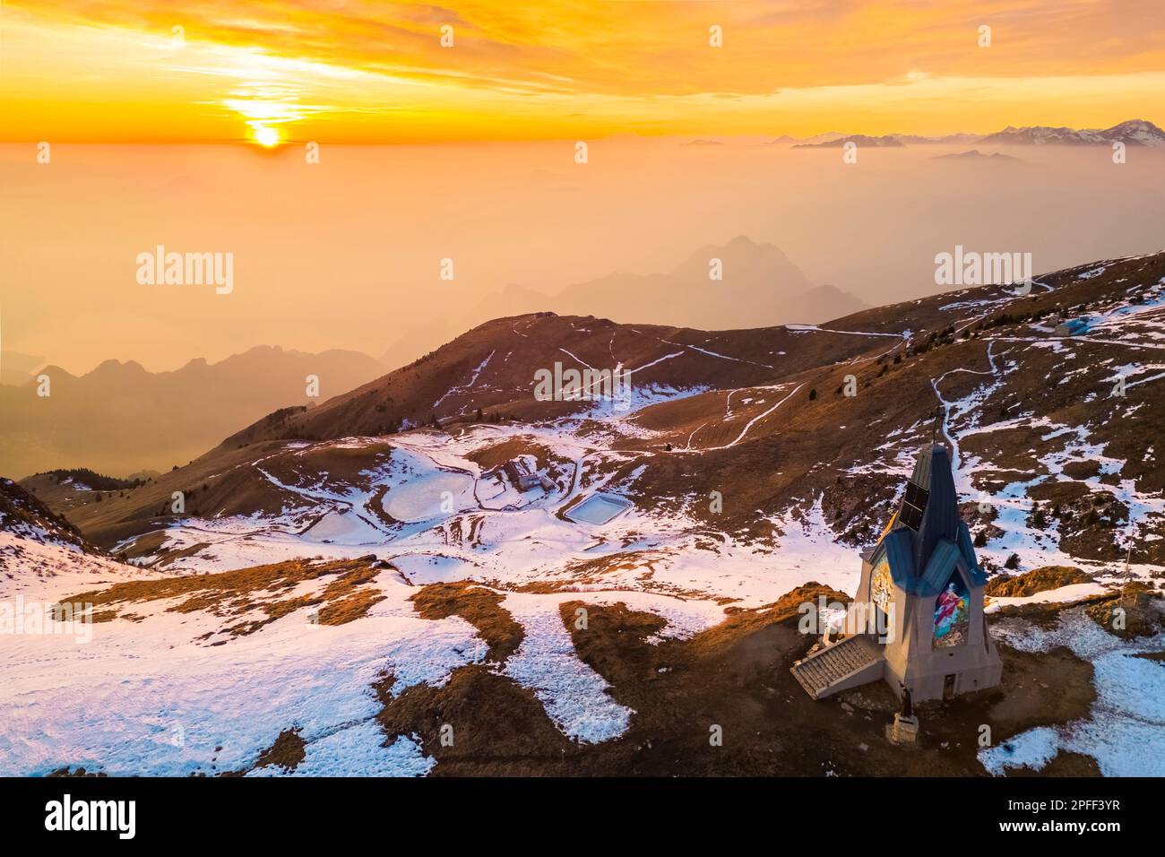 Aerial view of a winter sunset over Monumento al Redentore chapel on