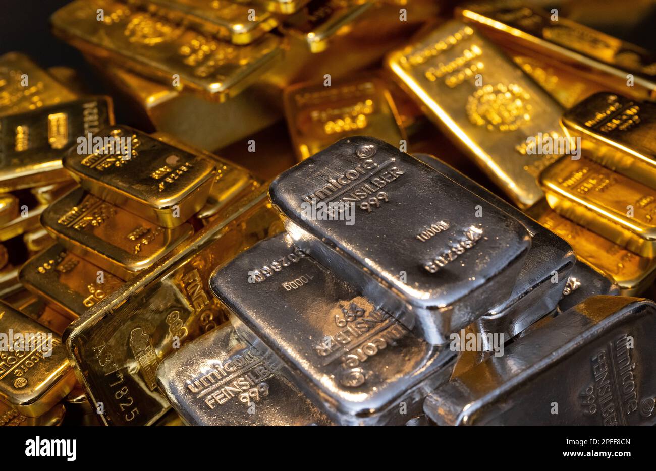 Munich, Germany. 16th Mar, 2023. Gold and silver bars of various sizes ...