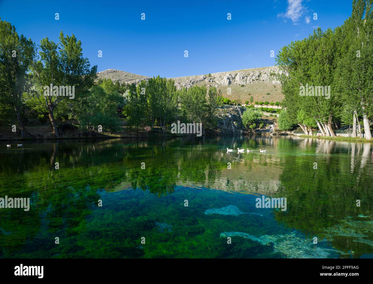 Blue lake in the park. View of Gokpinar Lake in the morning light. Gurun district, Sivas, Turkey Stock Photo