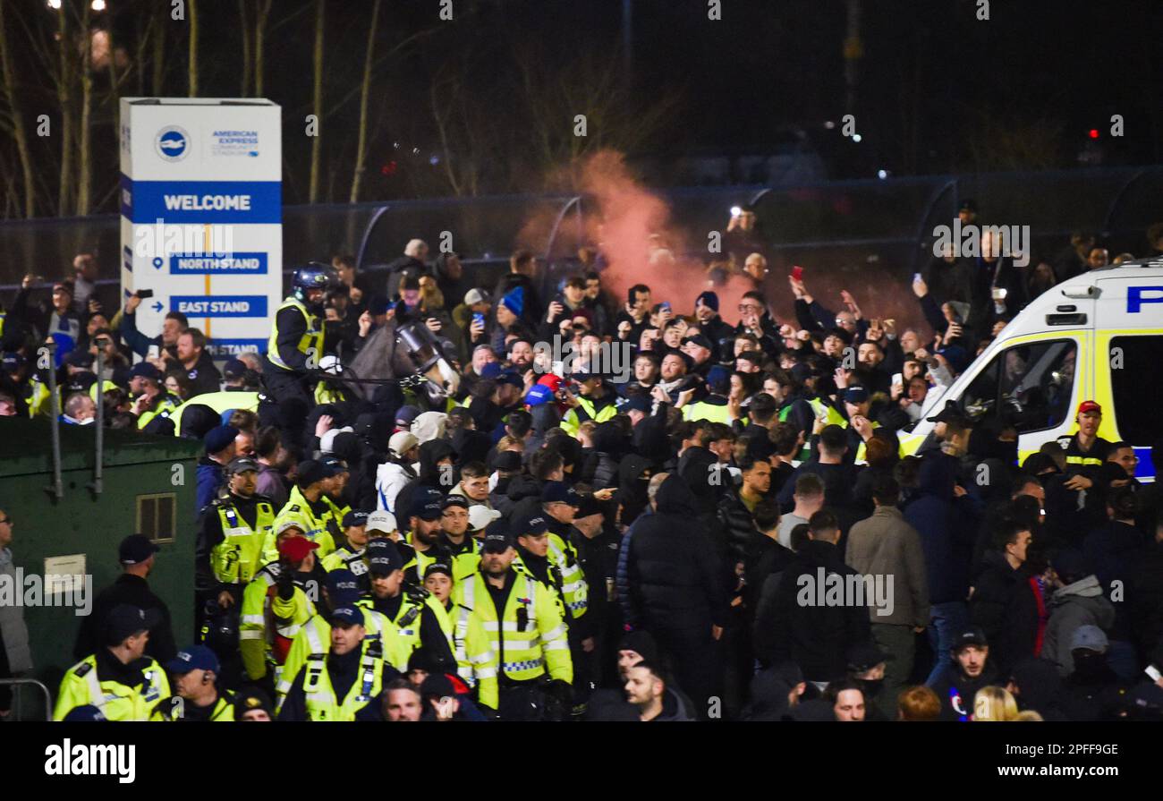 A flare is let off as Palace fans arrive during the Premier League match between Brighton & Hove Albion and Crystal Palace at The American Express Community Stadium , Brighton , UK - 15th March 2023 Photo Simon Dack/Telephoto Images  Editorial use only. No merchandising. For Football images FA and Premier League restrictions apply inc. no internet/mobile usage without FAPL license - for details contact Football Dataco Stock Photo