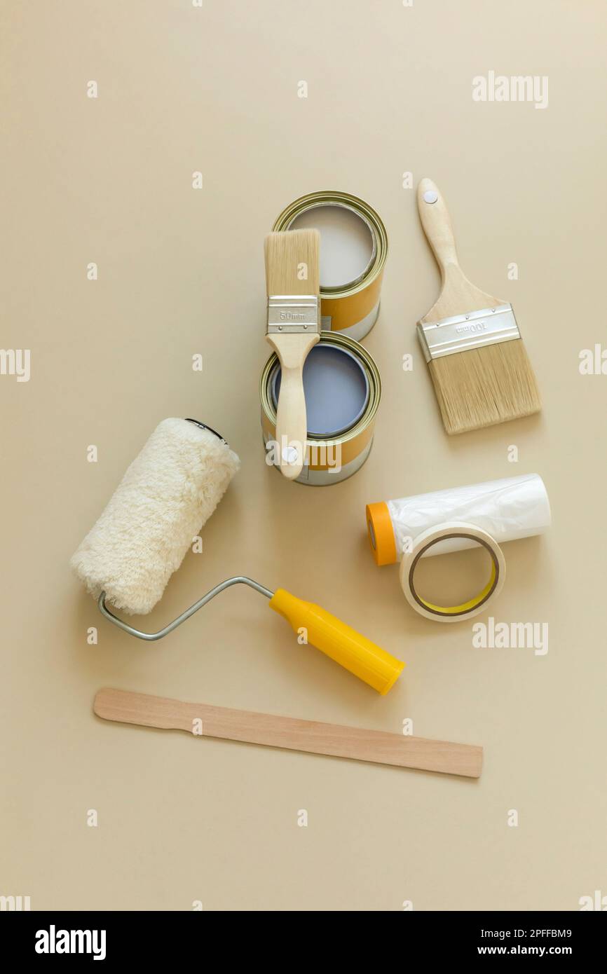 Paint Hand Tools DIY interior hand motion, closeup paint and paint tools Stock Photo - Alamy