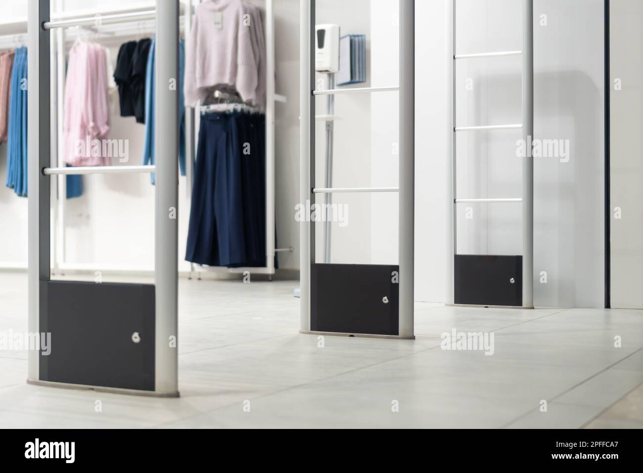 Antitheft system in a clothing store. Entrance gate with scanner to