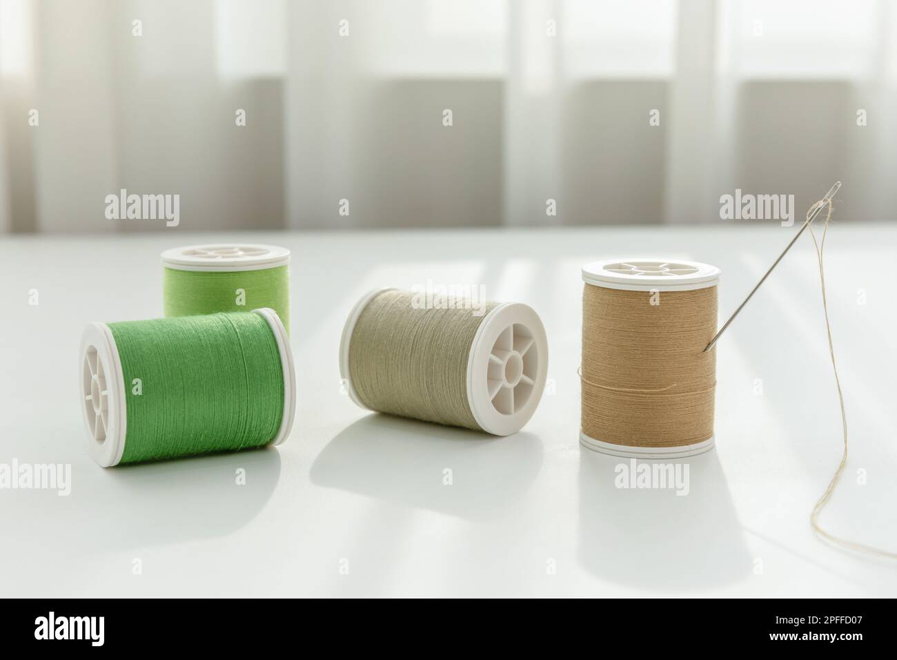 aesthetic photo of handmade, crafting hobbies, thread and a needle ...