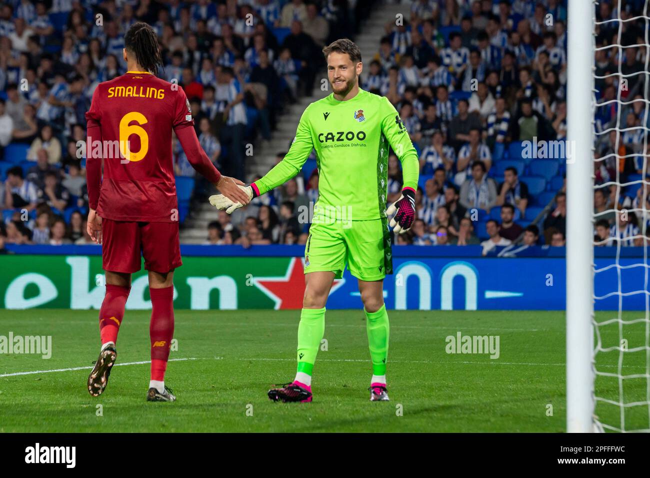Chris Smalling of AS Roma and Alejandro Remiro of Real Sociedad in action during UEFA Europa League round of 16, second leg match between Real Sociedad and AS Roma at Reale Arena. Donostia (Spain). March 16, 2023. (Gari Garaialde / Bostok Photo). Stock Photo