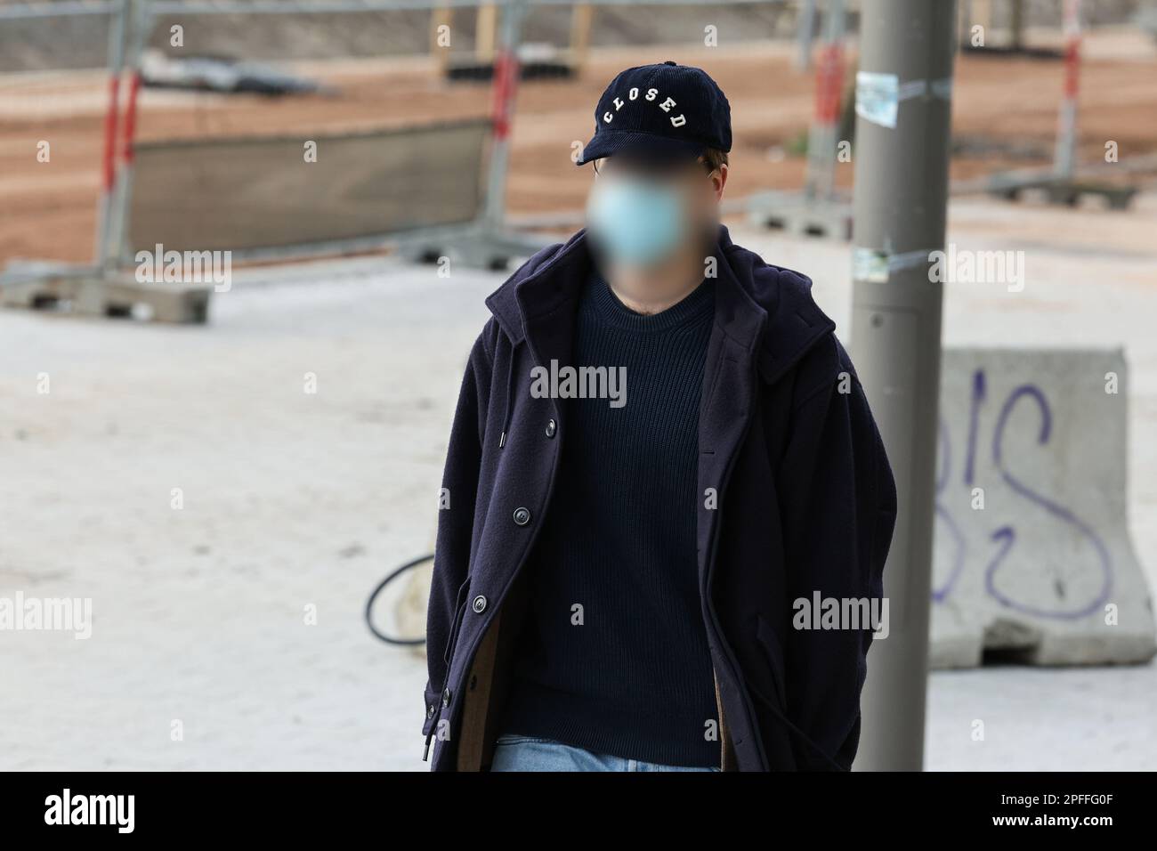 One of the accused arrives for a session of the case before the Antwerp