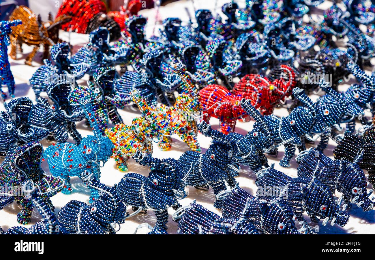 African curios of animals made from beads and wire at street flea market Stock Photo