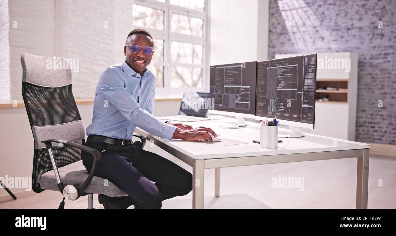 Programmer Coding Classes. Web Developer Coder In Office Stock Photo