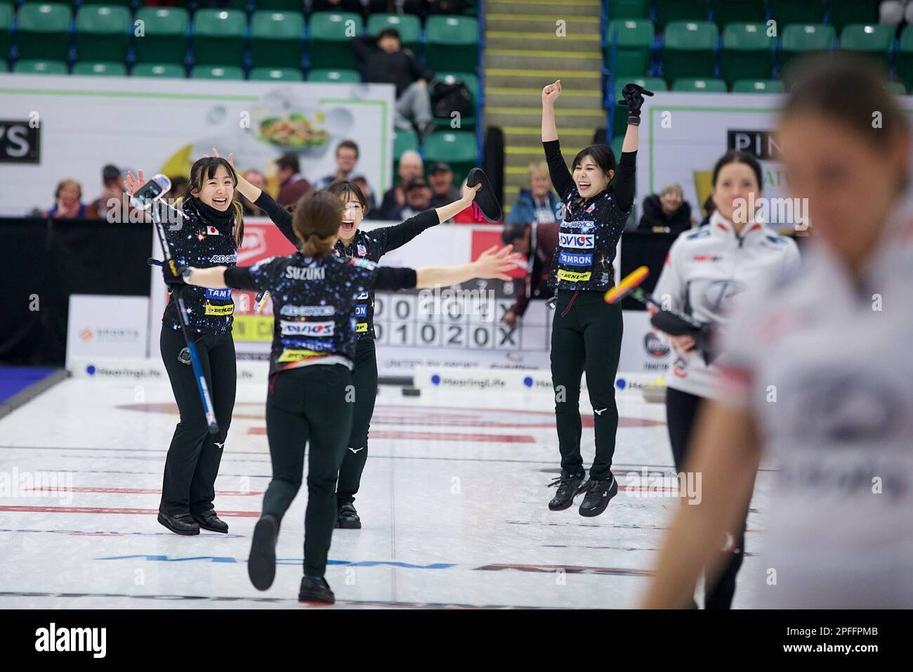 Team Fujisawa celebrate their victory in the final of the Grand Slam of  Curling - Canadian Open in Camrose, Alberta on January 15, 2023. From L to  R, Yumi Suzuki, Satsuki Fujisawa