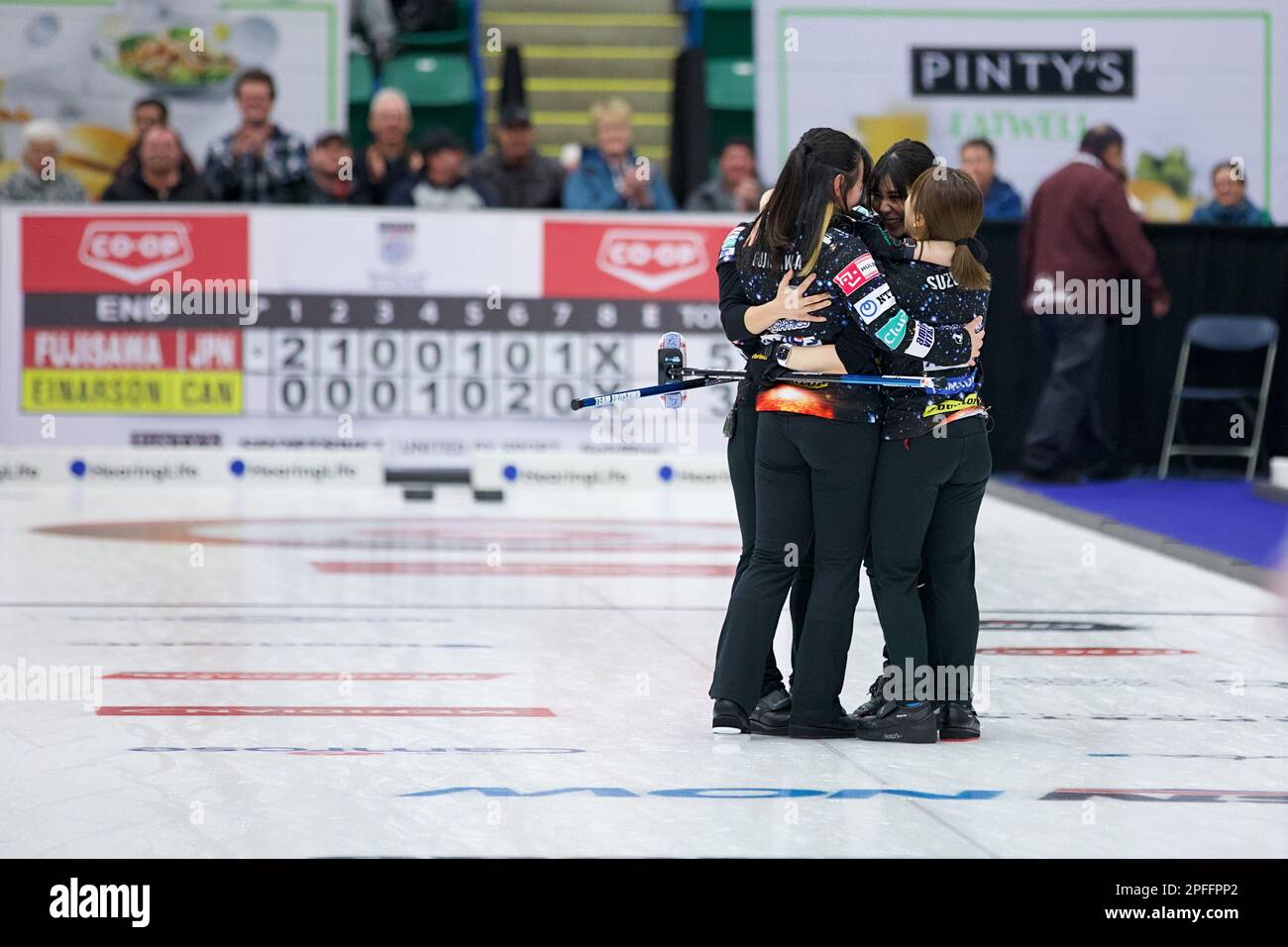 Team Fujisawa celebrate their victory in the final of the Grand Slam of Curling Canadian Open