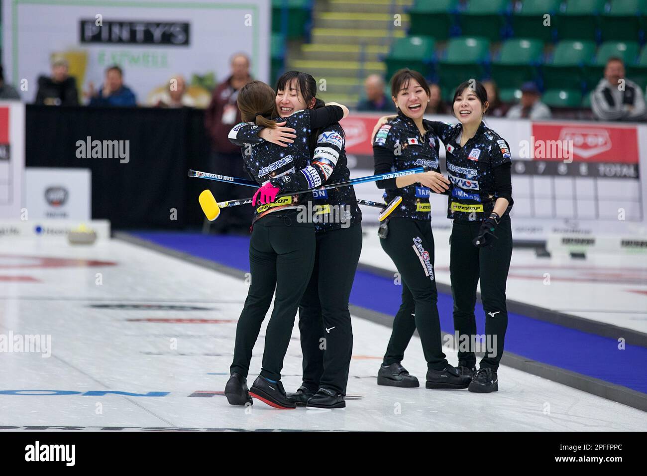 Team Fujisawa celebrate their victory in the final of the Grand Slam of Curling